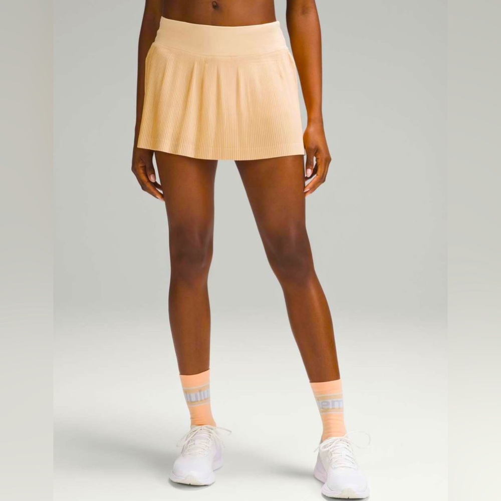 EUC Lululemon Summer Glow Pleat to Street Mid-Rise Tennis Skirt Sz 10/Retail $88